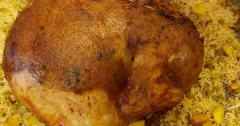 Roast Chicken Stuffed with Rice, Potatoes and Peas