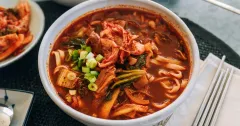 Spicy Kimchi Noodle Soup with Pork Belly