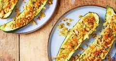 Garlic and Herb Stuffed Baked Courgettes with Pine Nuts