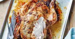 Jollof-Spiced Stuffed Roast Chicken with Spicy Peanut Sauce