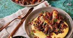 Braised Italian Sausages with Red Wine and Creamy Polenta