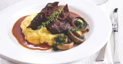 Slow-Braised Beef Cheeks in a Rich Red Wine Sauce