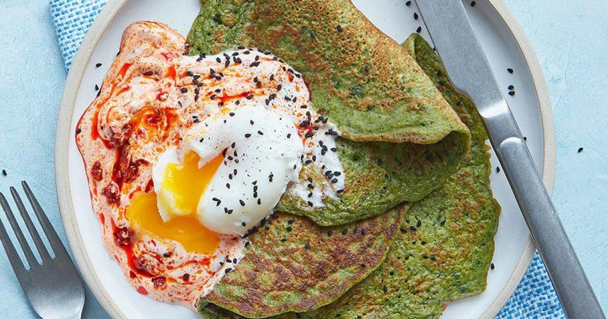 Spinach Pancakes with Harissa Yogurt and Poached Eggs