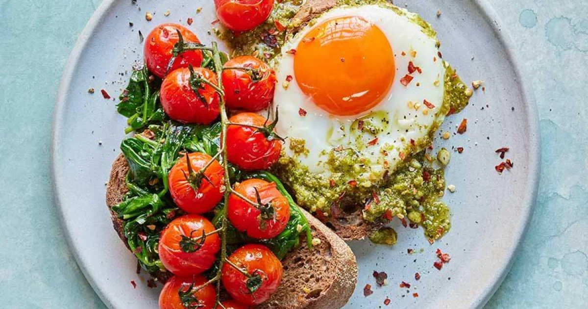 Healthy Pesto Eggs on Rye Toast with Wilted Spinach